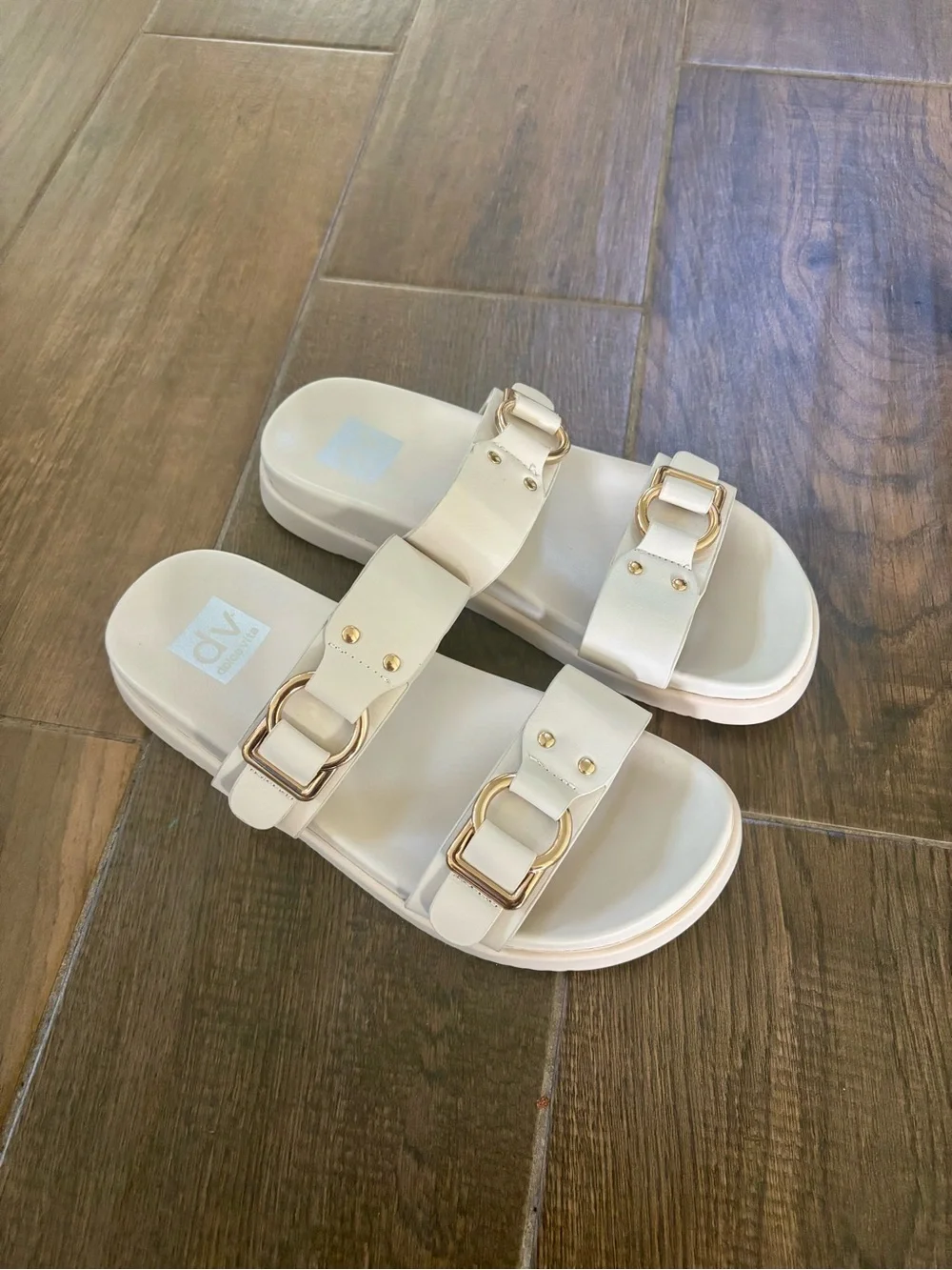 Dolce Vita | Cream Slide Sandals with Gold Buckles